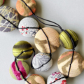 necklace-hiroko-peach-valerie-hangel-textile-jewellery-silk-kimono-collection-hiroko-unique-piece-galerie-h-geneva